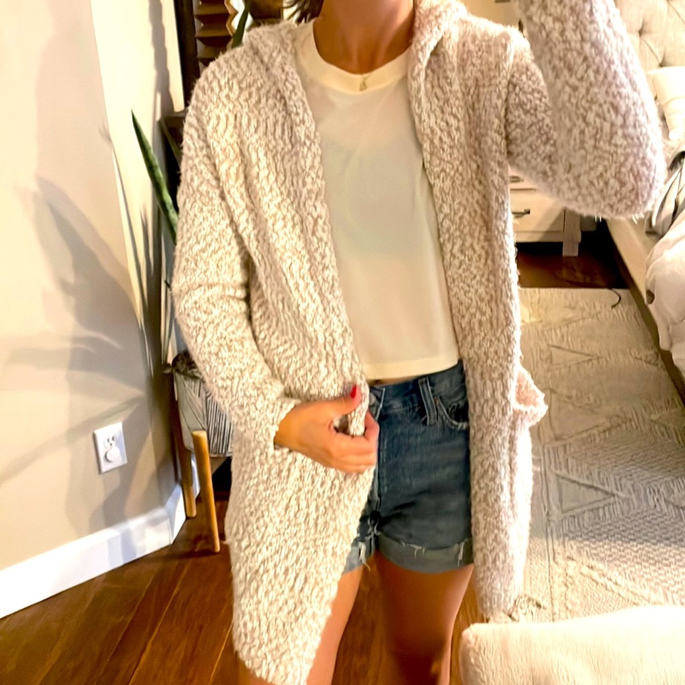 Lightly worn cardigan. Size small.